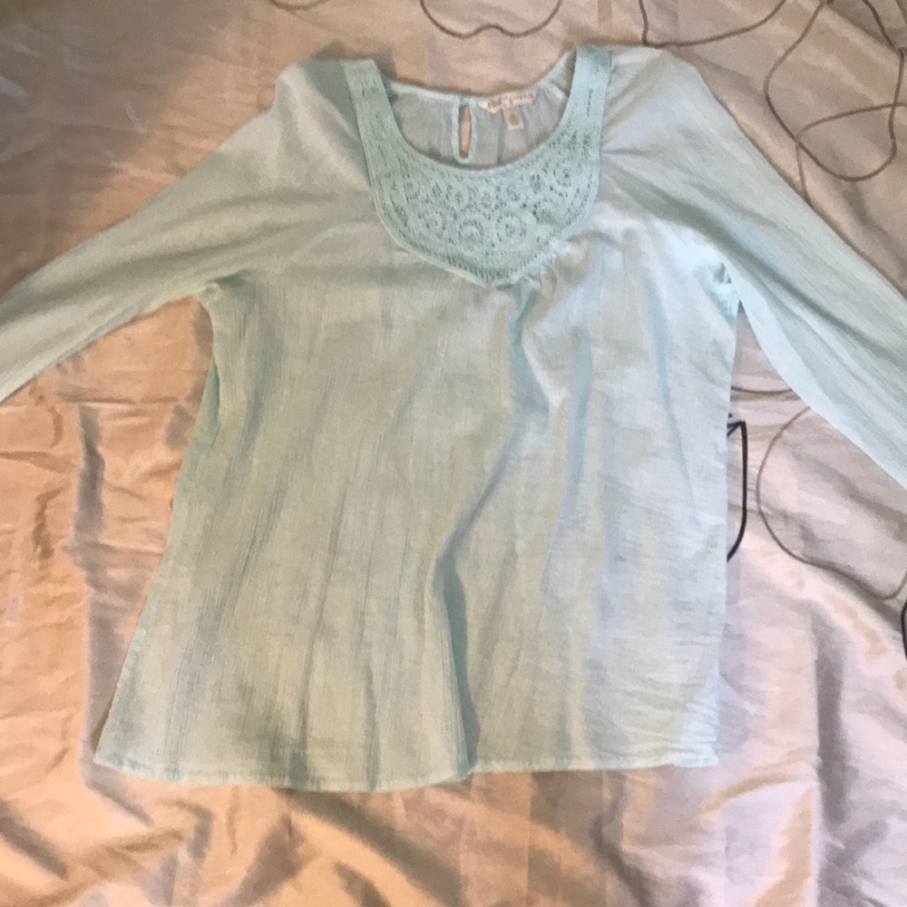 Sea blue/green shirt